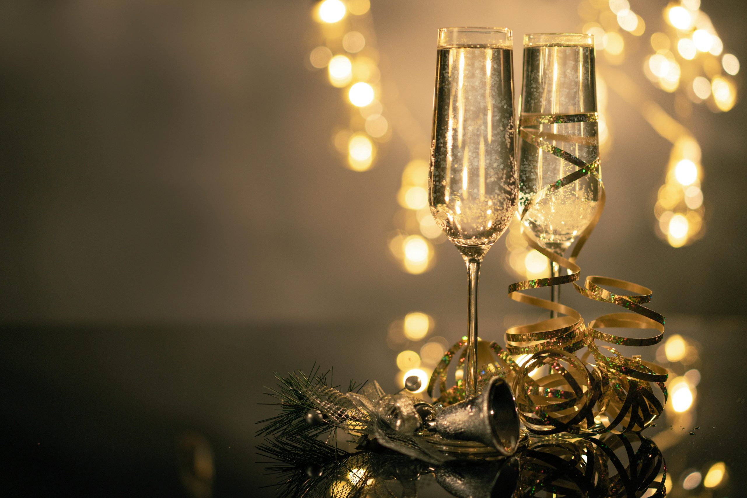 Champagne glasses with fairy lights